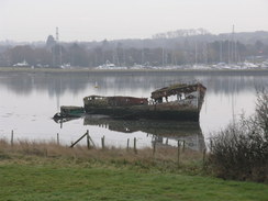 P20111041386	A rotting boat in an inlet.