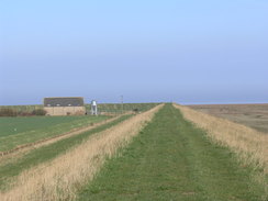 P20113243546	Approaching a farm barn near the bank.