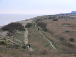 P20114074301	Looking south along he coast from the Coastguard Cottages on Dunwich Heath.