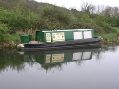 P20114134642	A narrowboat moored on the canal.