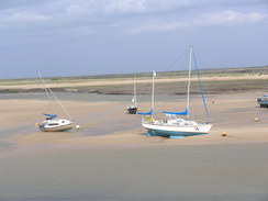 P20115236106	Boats in the pool at Wells-next-the-Sea.