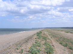 P20115246264	Heading east along the shingle beach from Cley Eye.