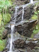 P2011DSC00239	A waterfall beside the track.