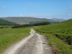 P2011DSC00487	Following the military road northwestwards from Allt Kinglass towards the birdge over the railway line.