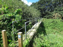 P2011DSC02670	A footbridge over a stream on Hinderclay Fen.