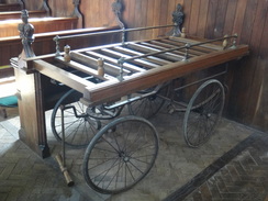 P2011DSC02725	A coffin trolley inside Wortham Church.