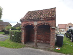 P2011DSC03129	An ornate bus stop near Searby church.