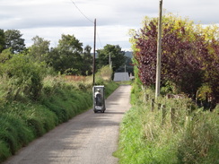 P2011DSC04460	A rather fast mobility scooter.