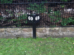 P2011DSC04539	A milespost beside a garden in Aberlour.
