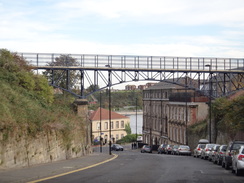 P2011DSC06135	A footbridge spanning a road.