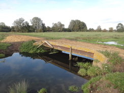 P2011DSC06401	A footbridge over a stream.