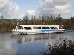 P2011DSC06561	A cruiser on the river.