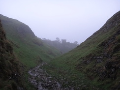 P2011DSC07561	Ascending Cave Dale, with Peveril Castle perched above.