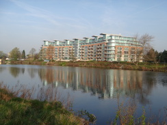 P2012DSC09429	A newly-built riverside block of flats.