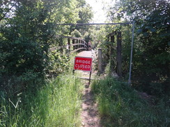 P2012DSC00417	A fence guarding a closed bridge over the Stour at Langham.