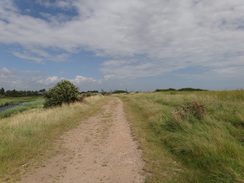 P2012DSC01637	Following the sea banking northeast into Harwich.