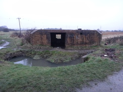 P2013DSC04621	A pillbox alongside the track leading to Hoo.