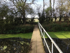 P2017DSC07071	A footbridge across a stream leading towards Buckden Marina.