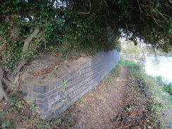 P2017DSC07100	An abutment of an old railway bridge over the river.