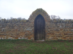 P2018DSC09046	A doorway in a wall guarding Upton Hall.