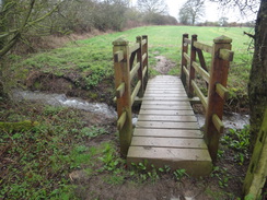 P2018DSC09572	A footbridge over a stream.