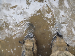 P2018DSC09625	My boots in a flooded path in Shotley.