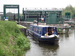 P2018DSC01122	A boat emerging from Orton Lock.