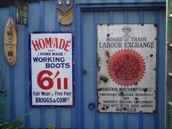 P2018DSC02465	Signs on a canalside building in Braunston.