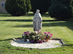 P2018DSC05139	A statue outside a Catholic Church in Bourton-on-the-Water.