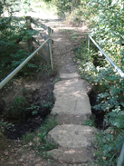 P2018DSC05209	A slab bridge over a stream on the way to Moreton-in-Marsh.