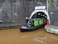 P2018DSC05568	A boat emerging from the western portal of the New Harecastle Tunnel.