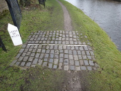 P2019DSC08735	The line marking the midpoint of the Leeds and Liverpool Canal.