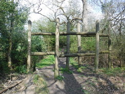 P2019DSCF2771	A barrier guarding th way into Scratch Wood.