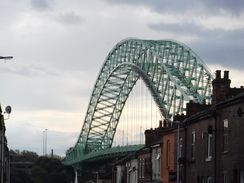 P2019DSCF3927	The Silver Jubilee Bridge looming over the rooftops.