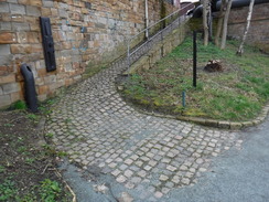 P2020DSCF4851	An old cobbled walkway up onto a bridge.