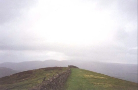 R13	The rain coming in from the east over Wideopen Hill.