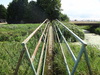 A footbridge over a drain.