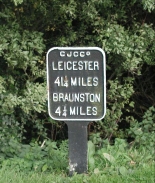 PA060014	A small cast-iron sign at Norton junction - Leicester 41.25 miles, Braunston 4.25 miles 