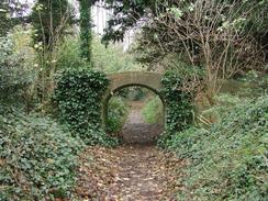 P2002B080082	A short bridge over a footpath in Dunwich. 