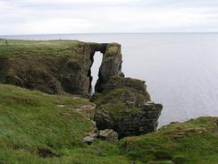 P20038197365	An archway in the cliffs south of the Castle of Old Wick.