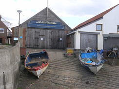 P20115246349	Boats outside a museum in Sheringham.