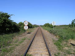P20115256456	Crossing the railway line at Beeston Regis.