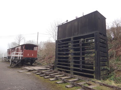 P2013DSC05166	A water tower and two brake vans at High Peak Junction.