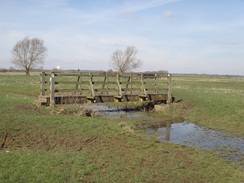 P2018DSC08805	A footbridge across a ditch to the north of Warmington.