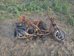 P2018DSC09334	The fossilised remains of a moped.