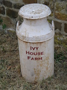 P2018DSC02355	A old milk churn outside a farm in West Farndon.