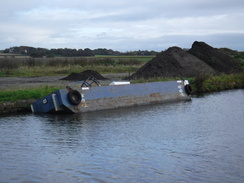P2019DSCF3489	A sunken maintenance boat to the north of Lydiate.